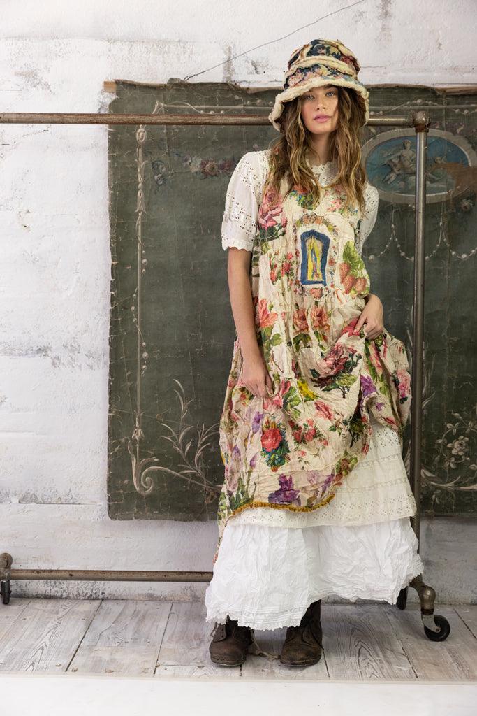 Magnolia Pearl model in whimsical vintage floral dress, artisan patchwork, unique boho clothing