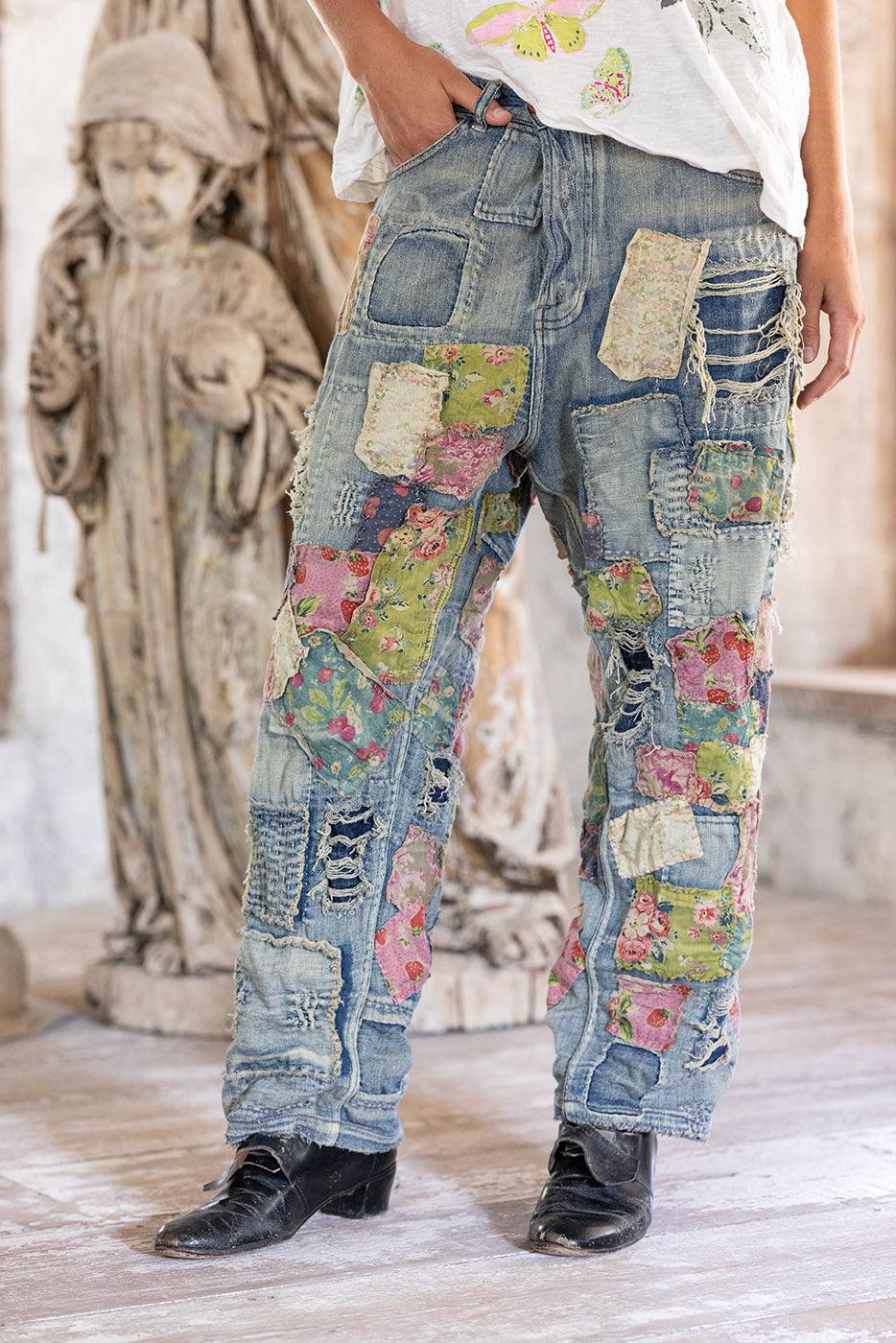 Jeans da minatore pesantemente rattoppati 