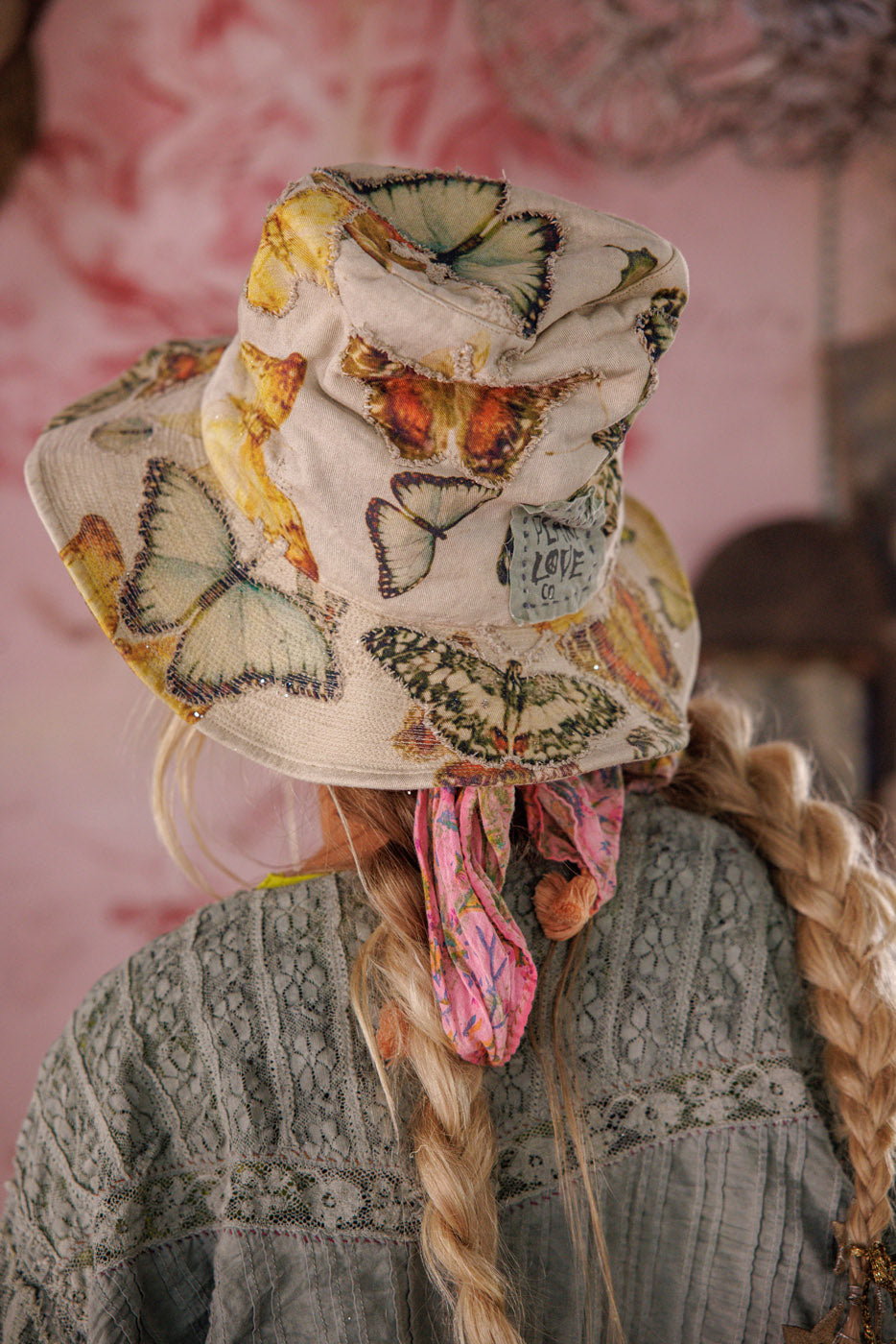 Magnolia Pearl artisan butterfly print vintage bucket hat, whimsical boho style, braided hair
