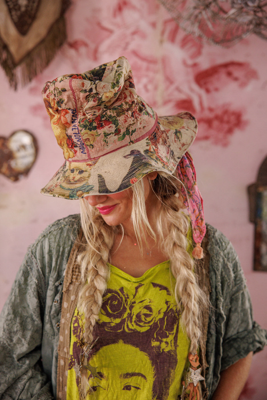 Woman wearing Magnolia Pearl artisan floral vintage patchwork hat and quirky boho clothing