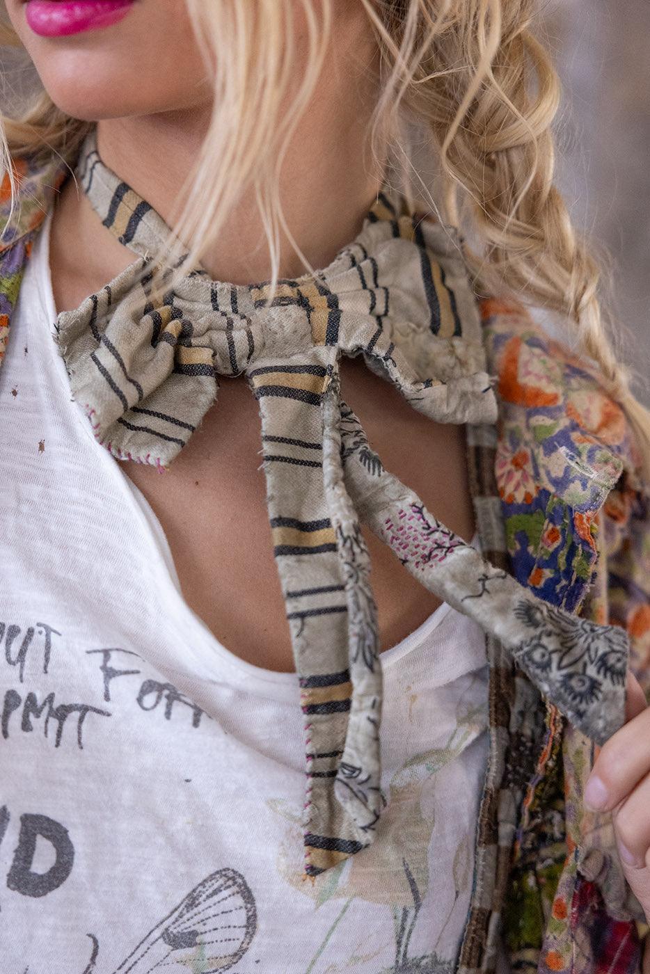 Magnolia Pearl artisan striped jabot scarf, vintage floral jacket, and whimsical graphic tee