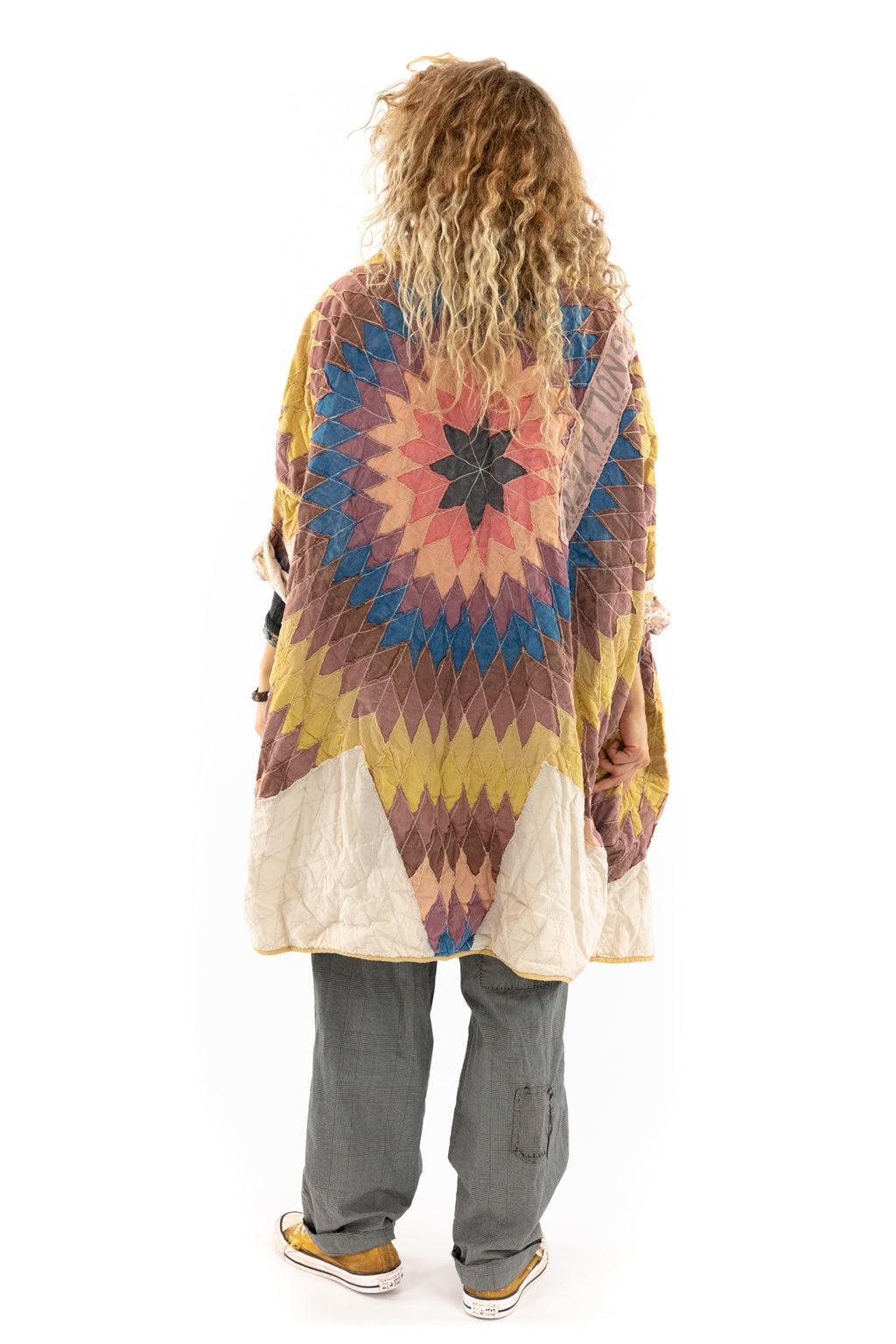 Woman wearing Magnolia Pearl patchwork artisan jacket, vintage casual pants, whimsical style