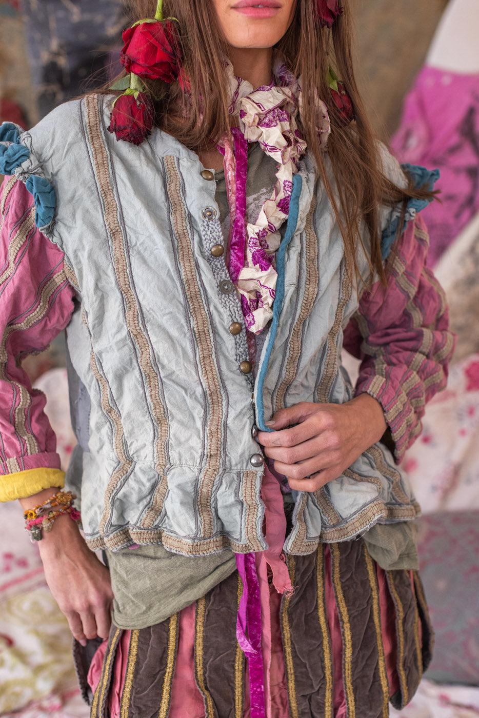 Woman modeling Magnolia Pearl artisan jacket and shorts with vintage, whimsical floral styling