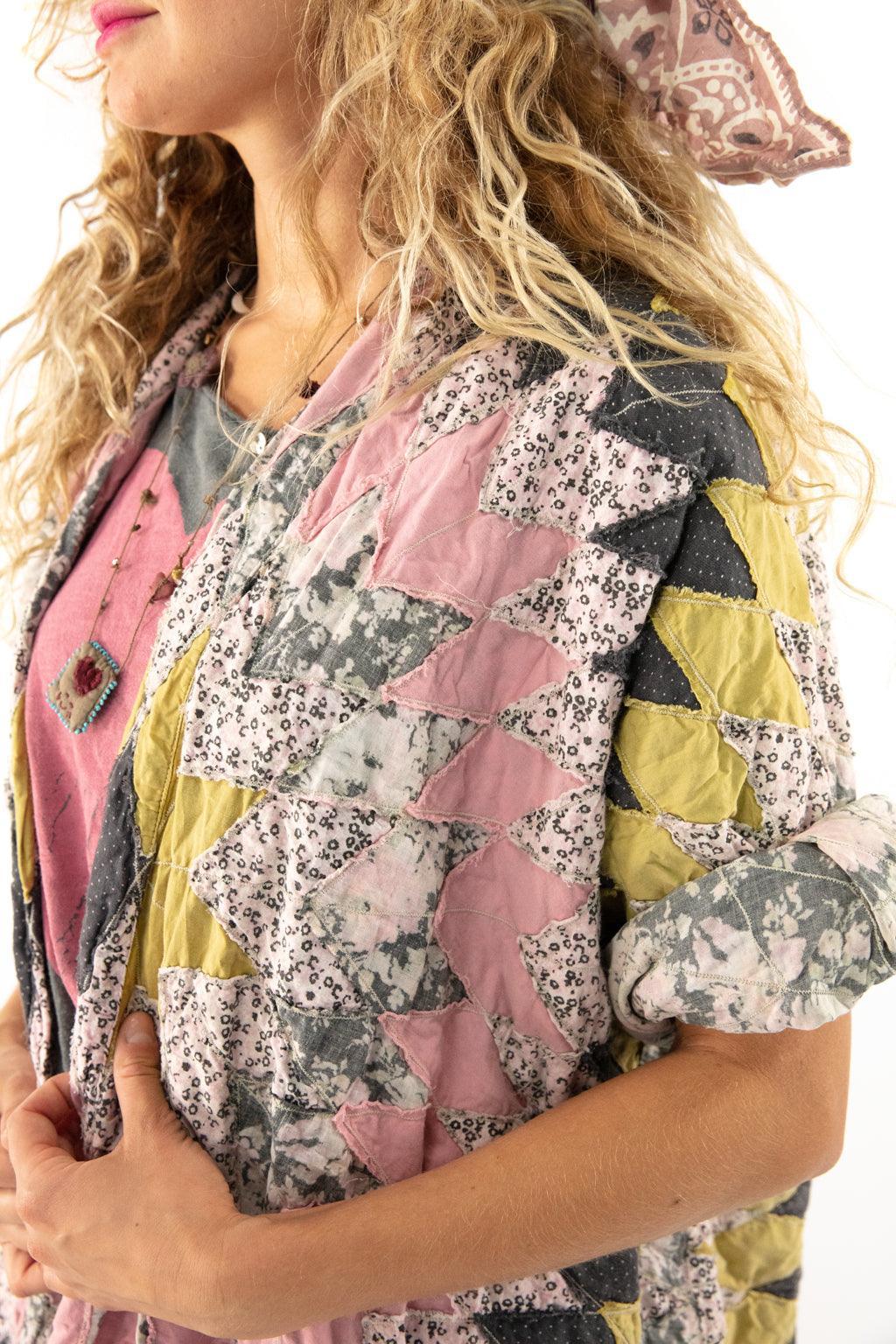 Woman in Magnolia Pearl artisan vintage patchwork duster, distressed jeans, bandana, whimsical style