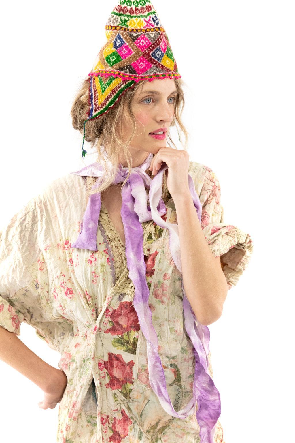 Magnolia Pearl artisan floral jacket with whimsical vintage style, colorful hat, unique fashion