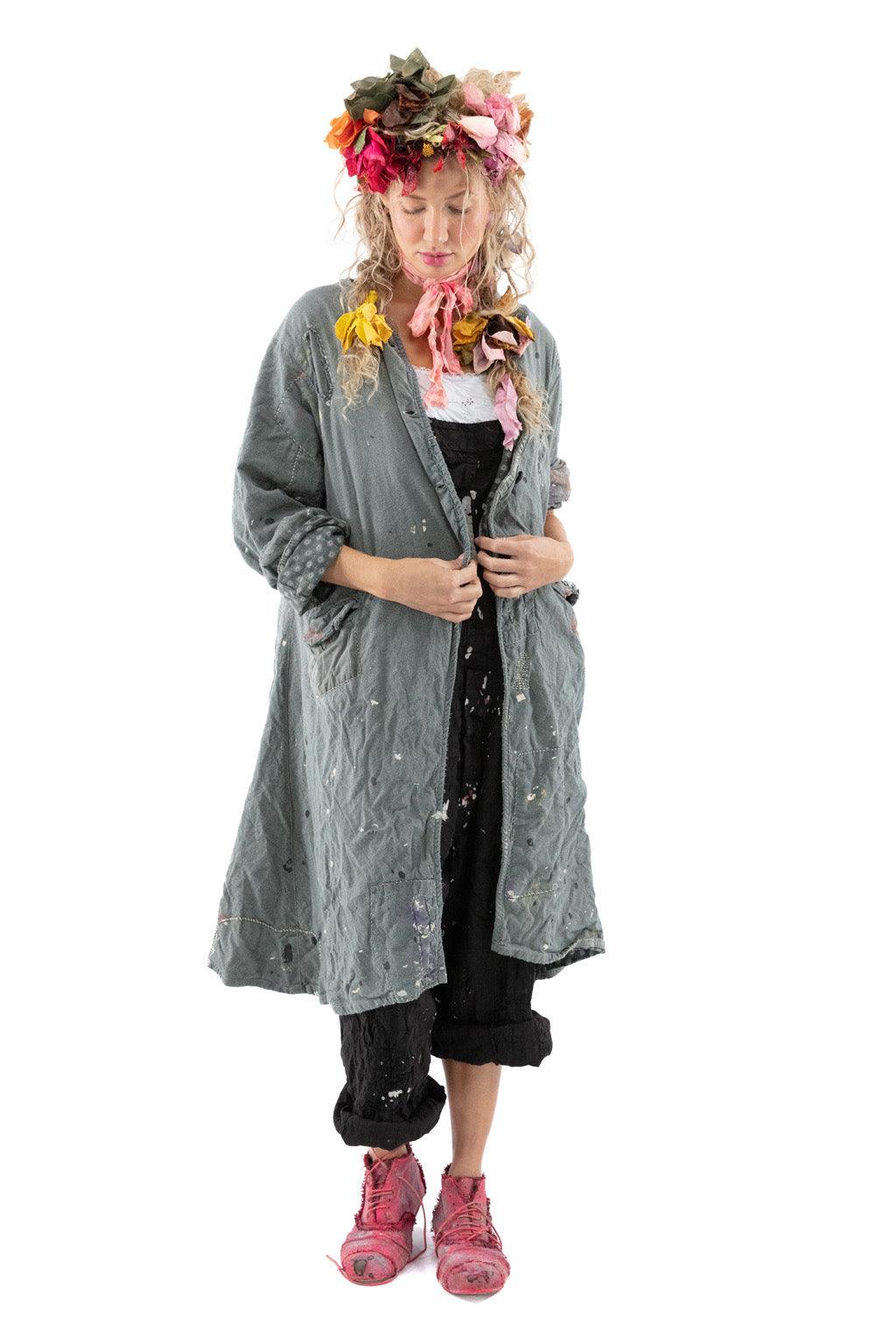 Woman in Magnolia Pearl artisan vintage jacket, floral crown, whimsical distressed style