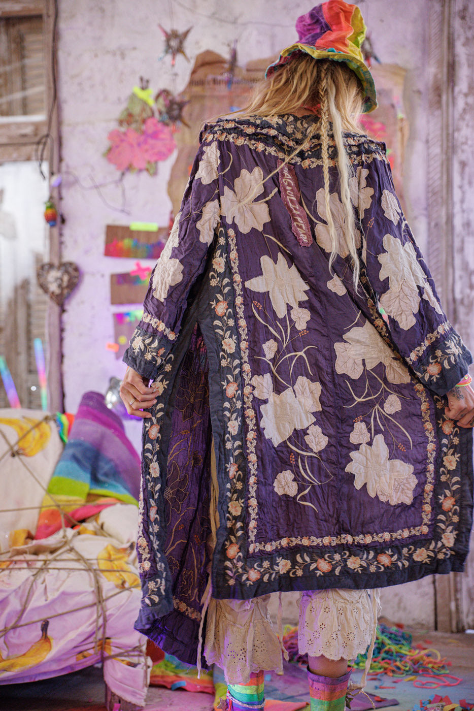 Artisan Magnolia Pearl jacket with whimsical floral embroidery, vintage style, colorful setting