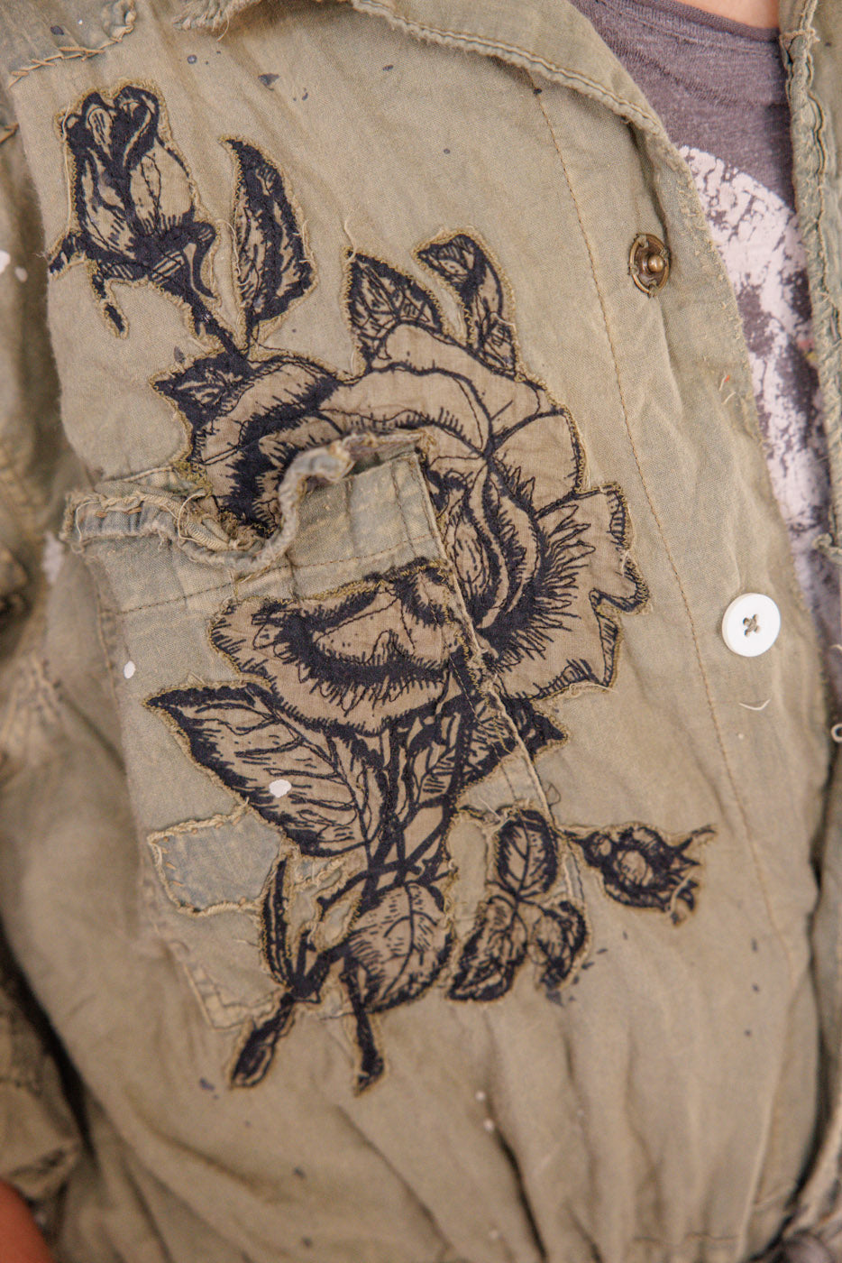 Mother Nature Coveralls Magnolia Pearl Clothing, green color with embroidered butterflies and deer prints and roses.