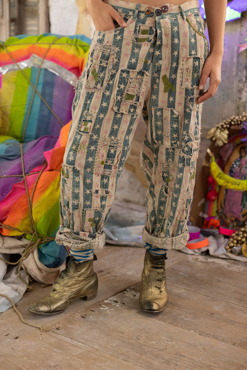 Magnolia Pearl cotton pants featuring hand-faded star pattern and patchwork details