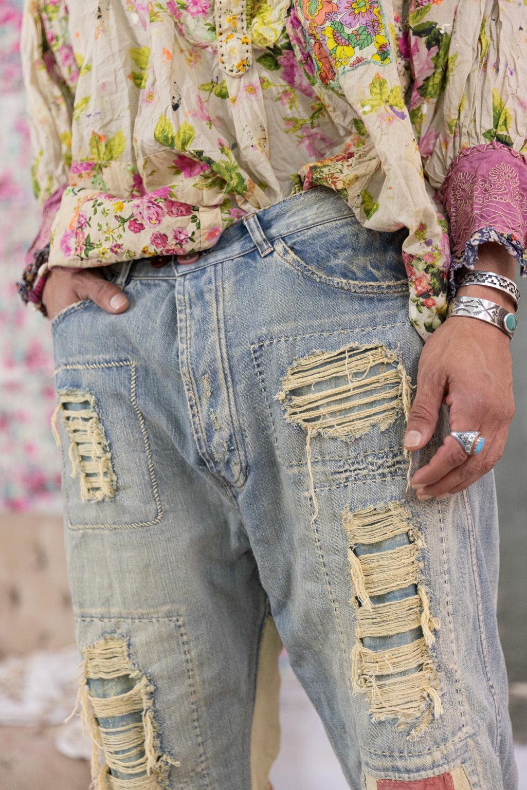 Magnolia Pearl artisan distressed denim pants with patchwork and vintage boots, whimsical style