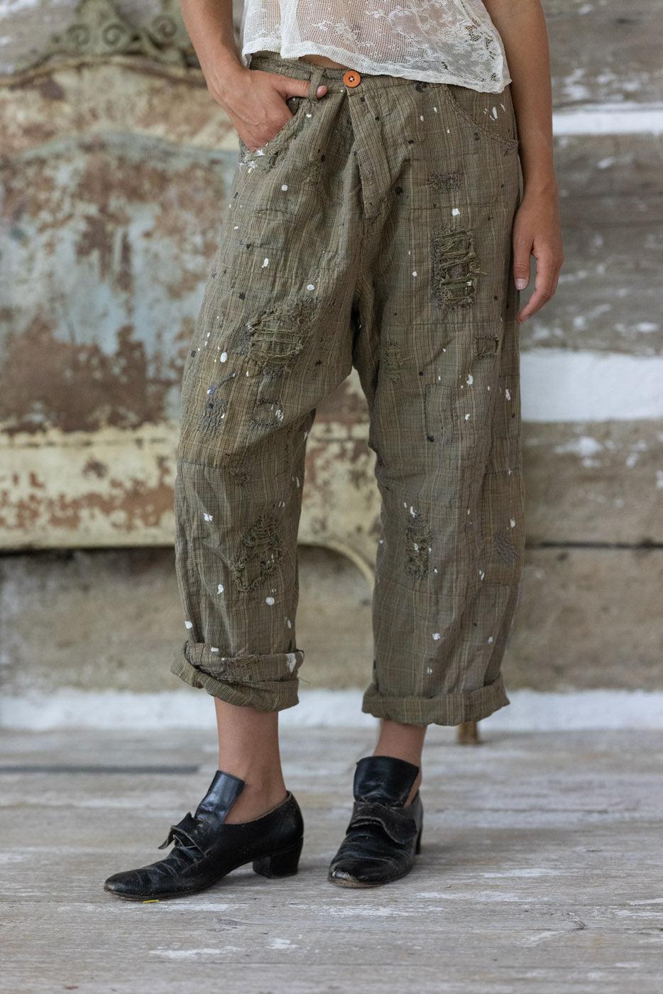 Magnolia Pearl artisan distressed khaki pants with whimsical paint splatter, vintage style