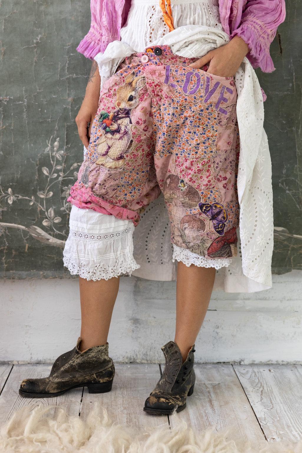 Magnolia Pearl artisan pink patchwork shorts with vintage rabbit and butterfly embroidery, whimsical and unique design