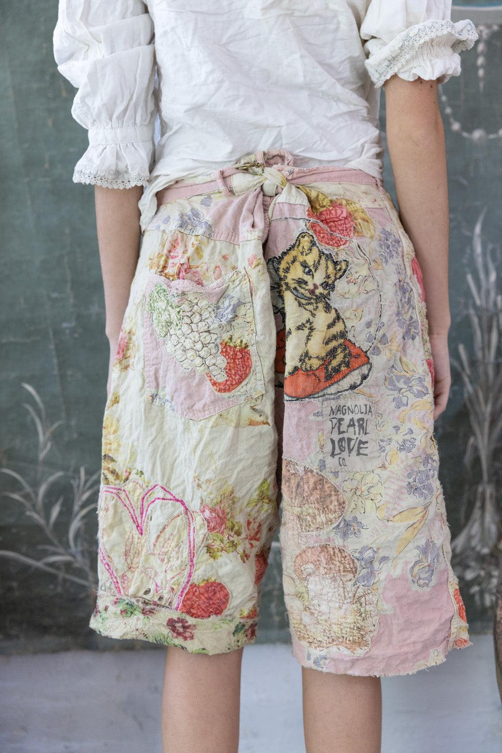 Magnolia Pearl artisan vintage patchwork shorts with whimsical cat and floral designs