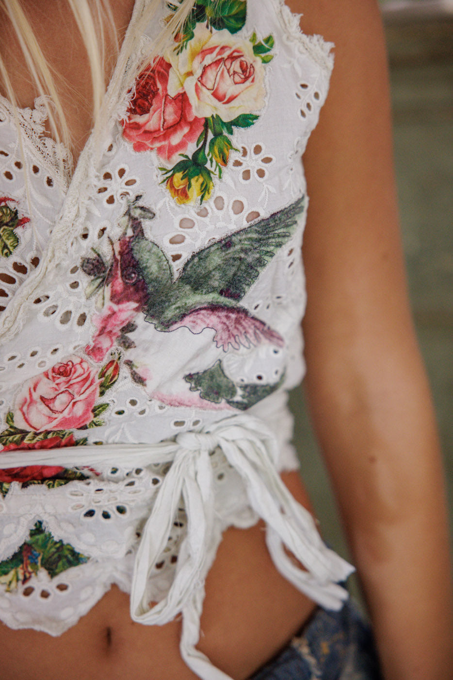 Magnolia Pearl artisan eyelet wrap top with vintage hummingbird and rose print, whimsical style