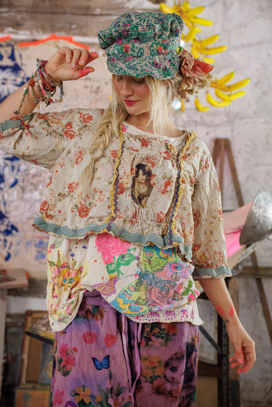 Magnolia Pearl artisan floral vintage top and colorful whimsical pants, model in boho studio
