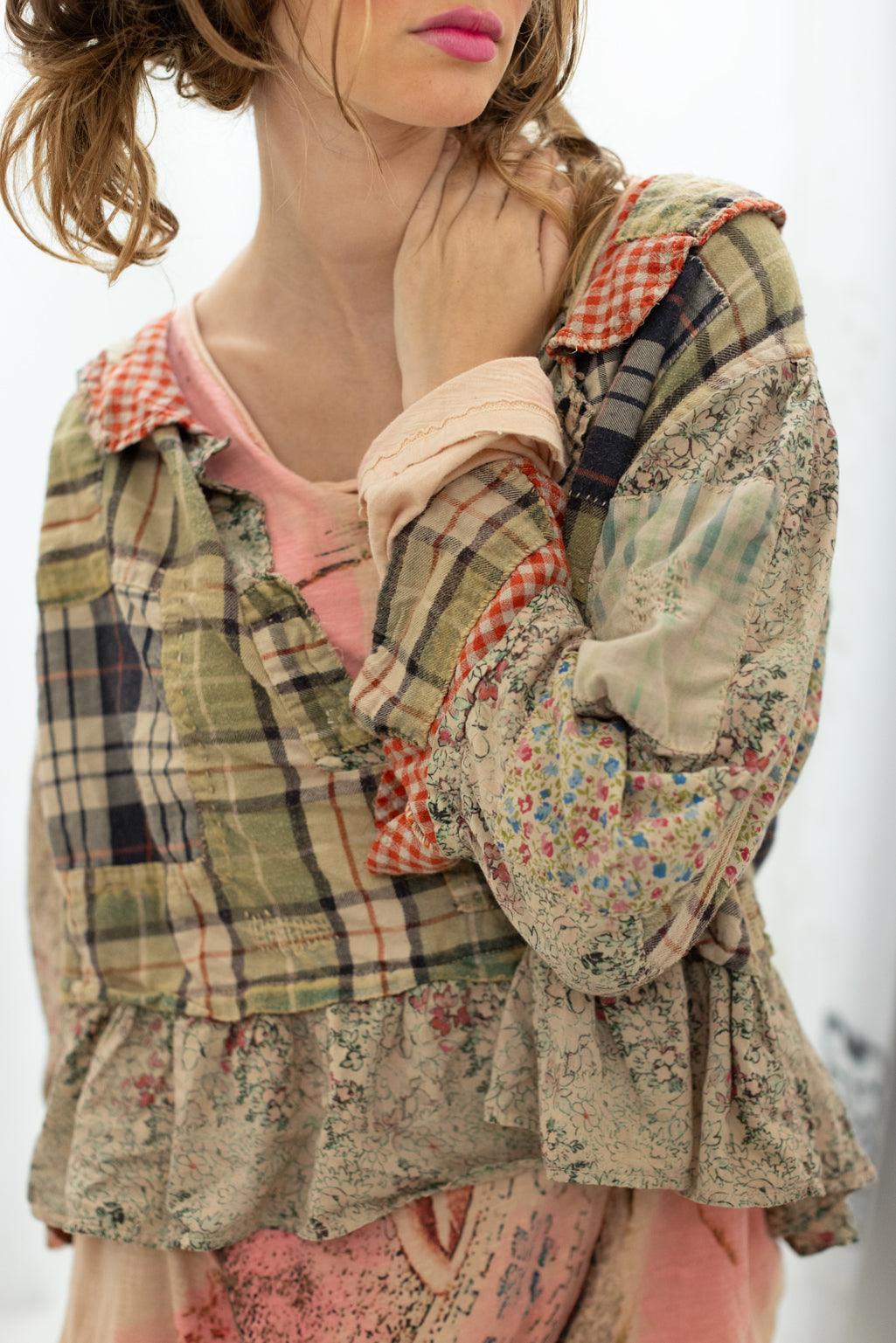 Woman wearing Magnolia Pearl artisan patchwork blouse with vintage floral, plaid, and ruffle details