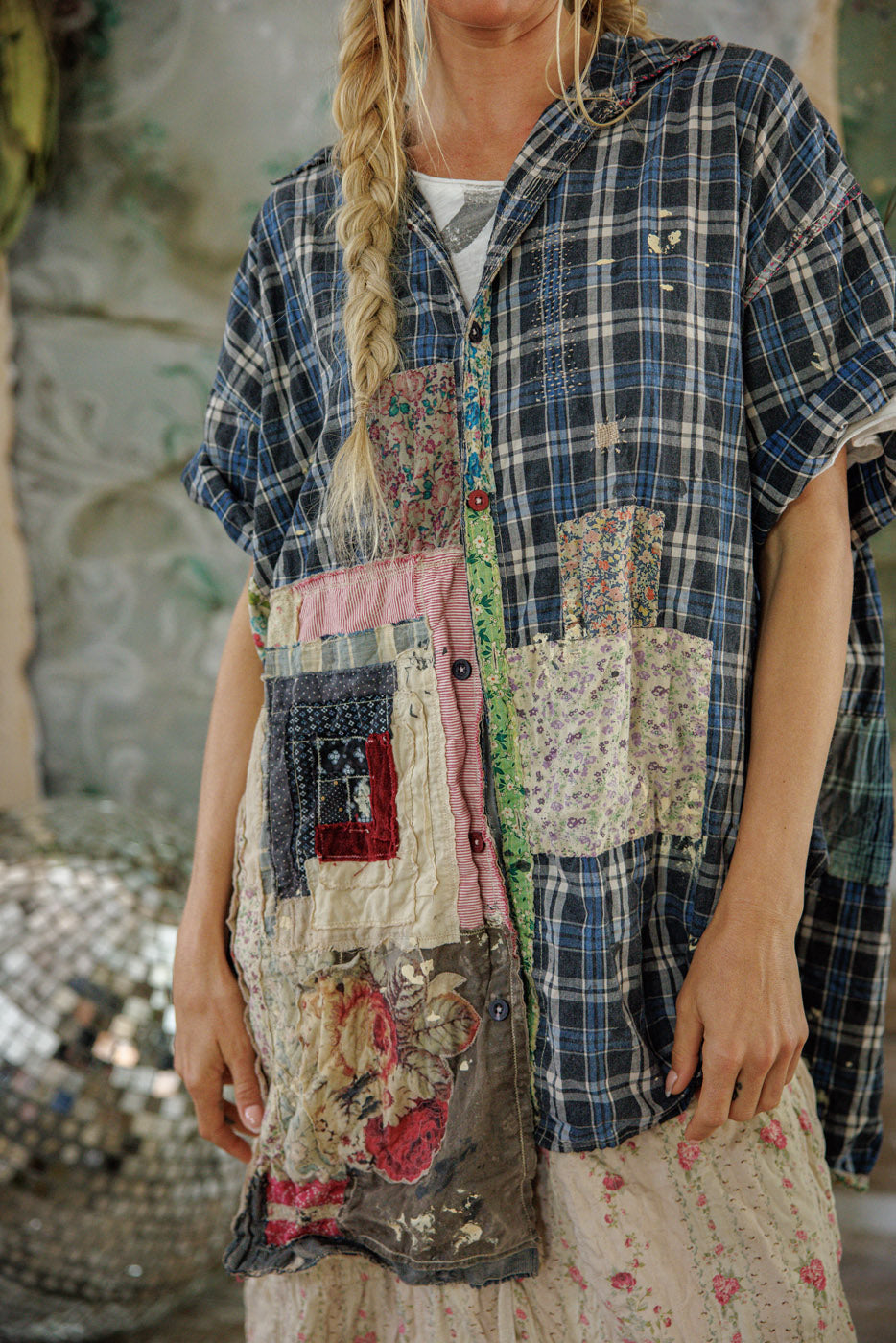 Woman wearing Magnolia Pearl artisan patchwork plaid shirt with whimsical vintage floral details