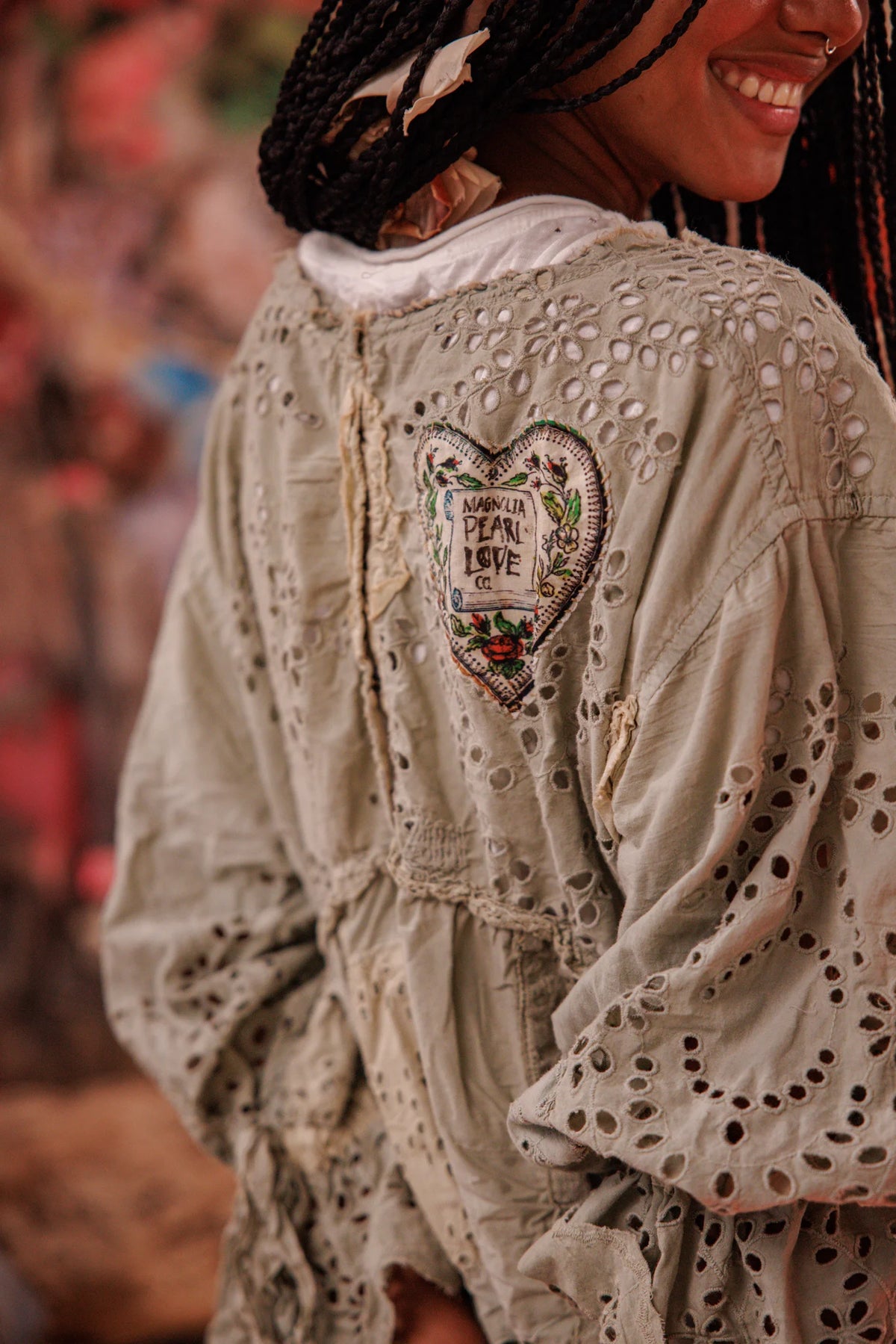 Blusa Alian con occhielli grigio verde mare 