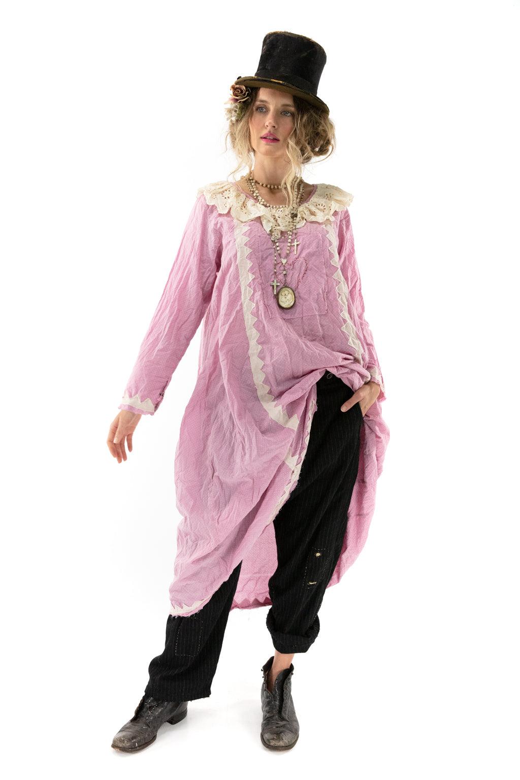Magnolia Pearl model in pink vintage artisan dress, lace collar, top hat, layered jewelry