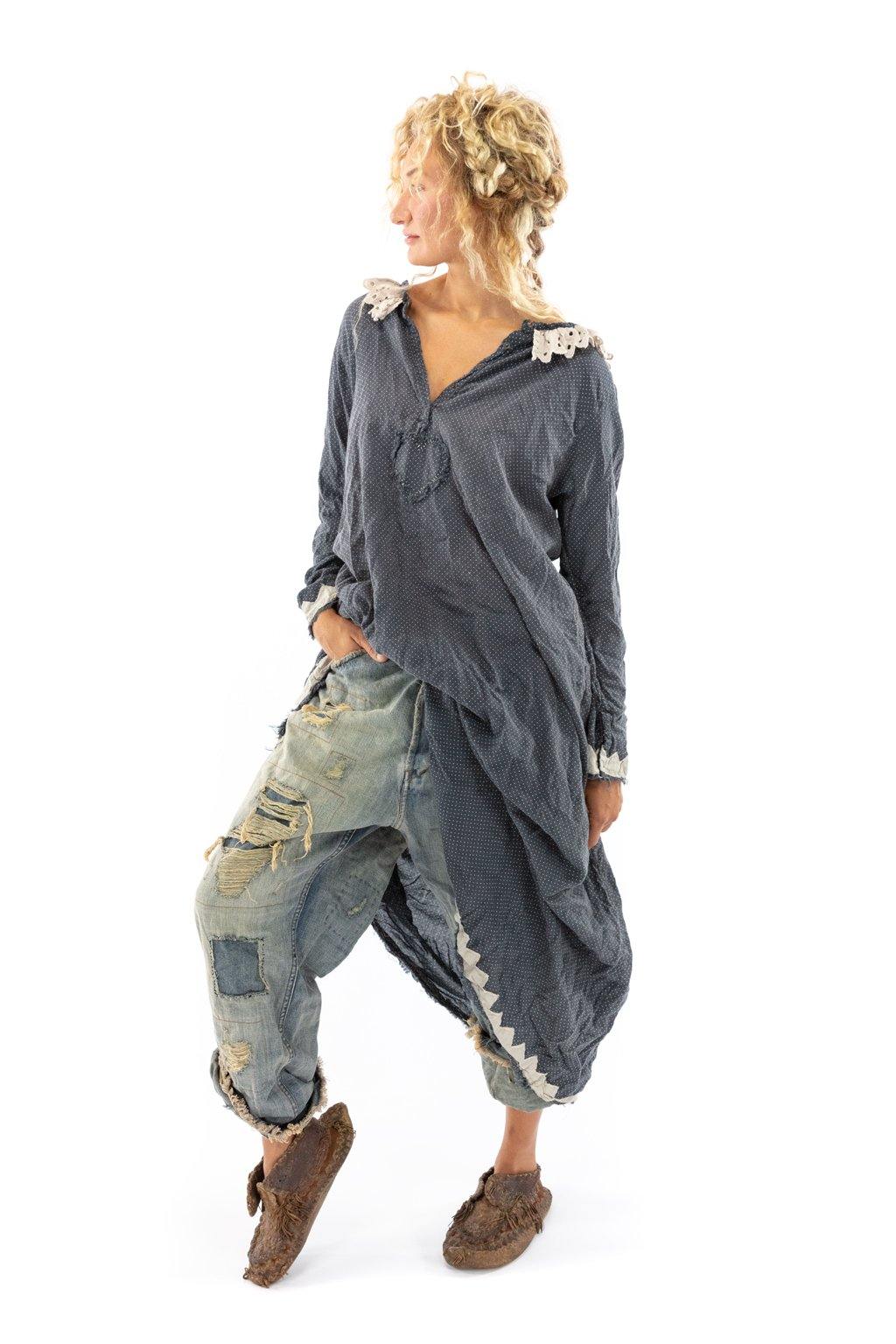 Woman in Magnolia Pearl whimsical vintage artisan dress with lace collar and patchwork jeans