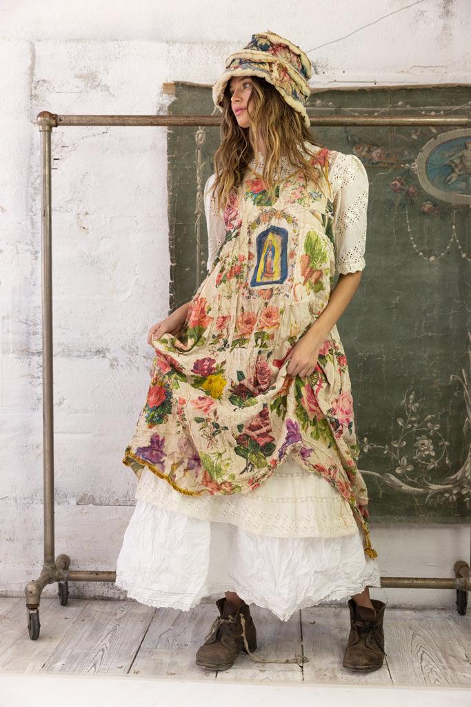 Magnolia Pearl model in whimsical vintage floral dress, artisan patchwork, unique boho clothing