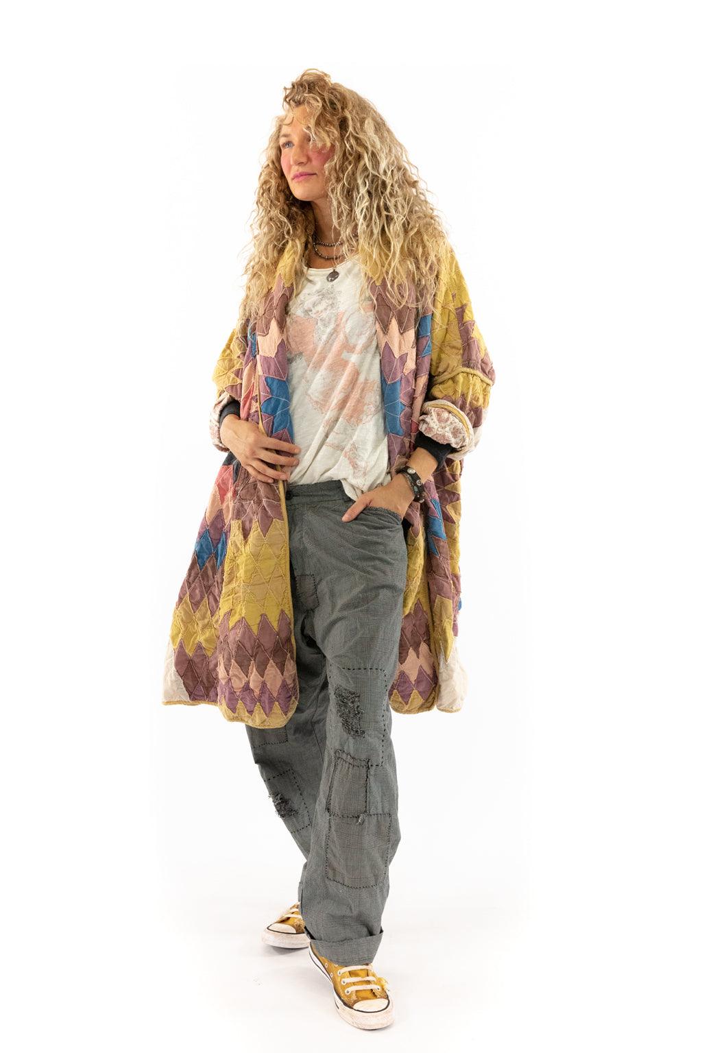 Woman wearing Magnolia Pearl patchwork artisan jacket, vintage casual pants, whimsical style
