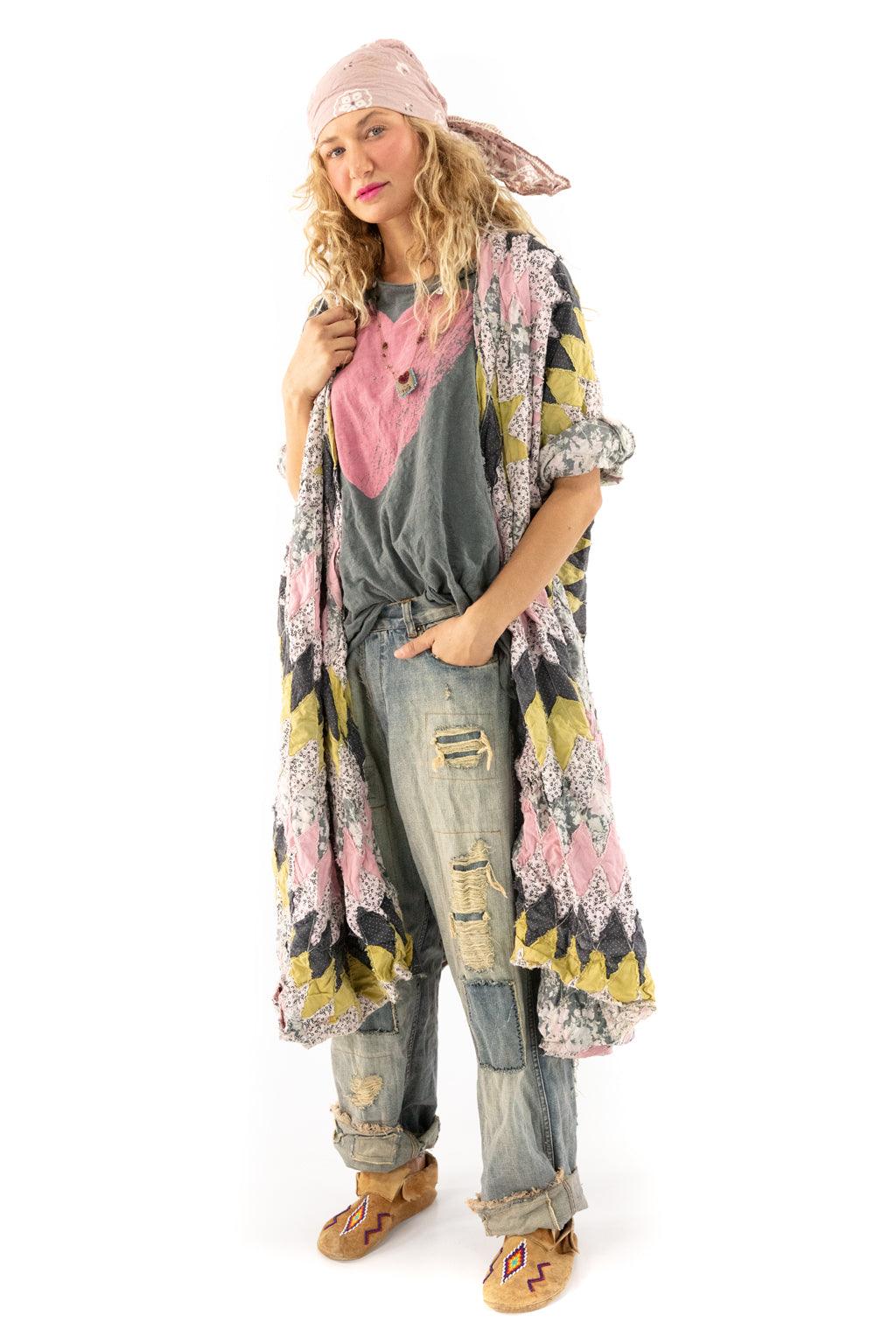 Woman in Magnolia Pearl artisan vintage patchwork duster, distressed jeans, bandana, whimsical style