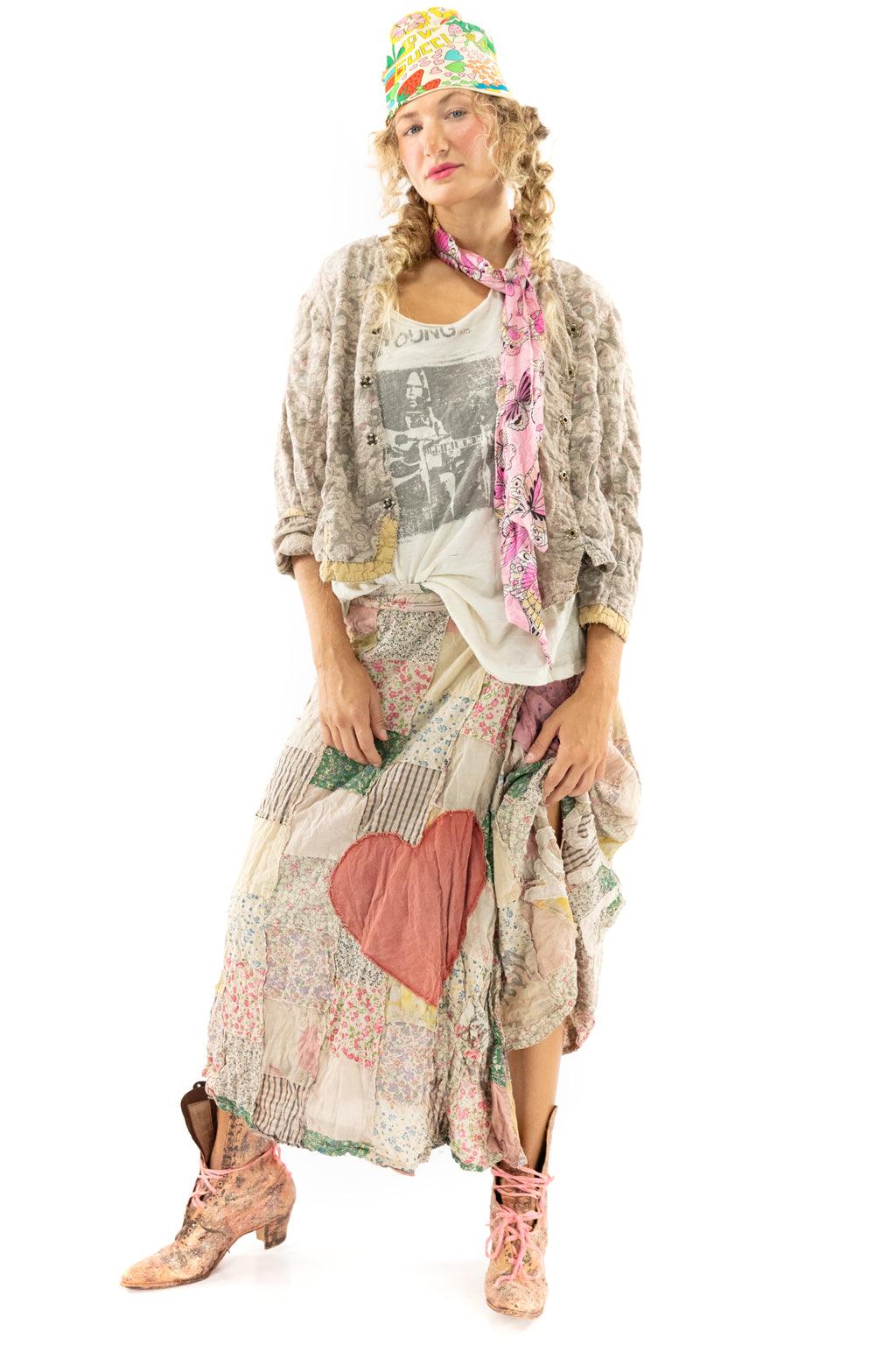 Magnolia Pearl whimsical vintage patchwork skirt, lace jacket, graphic tee, floral hat, artisan boots